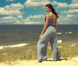 Lake Michigan Shoreline Fashion Photography — Hoffmaster State Park Fashion portrait of woman in blue wide-leg jumpsuit looking out over Lake Michigan shoreline at Hoffmaster State Park Muskegon Michigan