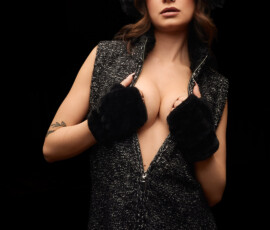 Detroit Metro Michigan Bold Dark Glamour Studio Fashion Photography — Charcoal Boucle Zip Dress Fur Pom Gloves Upward Gaze Bold dark glamour studio fashion portrait woman charcoal boucle zip dress open chest fur pom gloves pom headband botanical tattoo upward side gaze dramatic studio lighting Detroit Metro Michigan